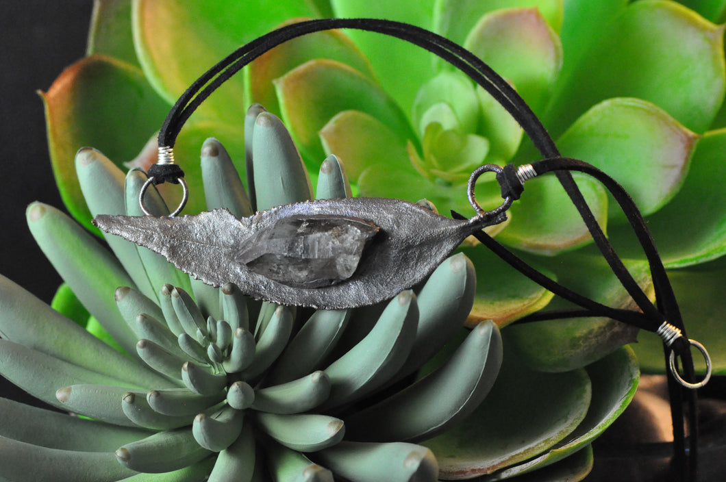 Calming Smoky Quartz on Butterfly Bush Leaf